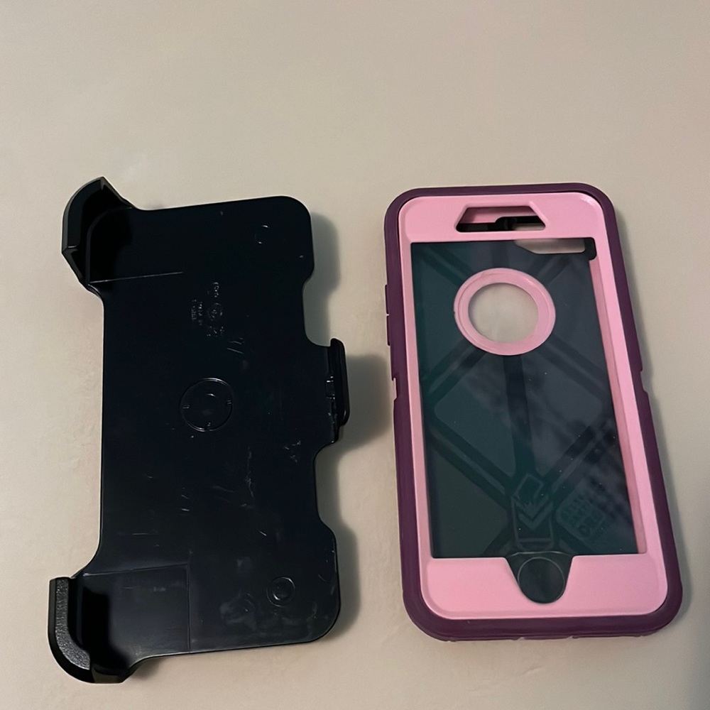 Purple OtterBox phone case for iPhone 7 includes phone holster